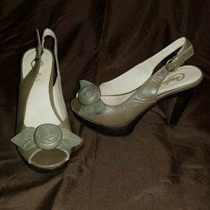 Tan peep toe heels with flower detail